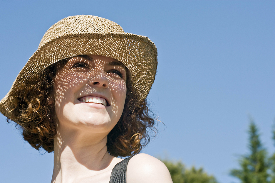 Woman outdoors in hat